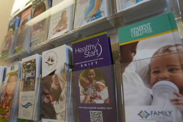 A Healthy Start pamphlet is displayed with others at the Oklahoma State University obstetrics and gynecology clinic in Tulsa, Okla., on Tuesday, July 16, 2024. (AP Photo/Mary Conlon)