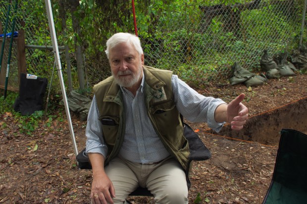 Dr. Eric Klingelhofer, vice president of research for the First Colony Foundation, discusses the implications of a brass ring found during an archeological dig on Roanoke Island on the Outer Banks. (Photo by Kip Tabb/freelance)