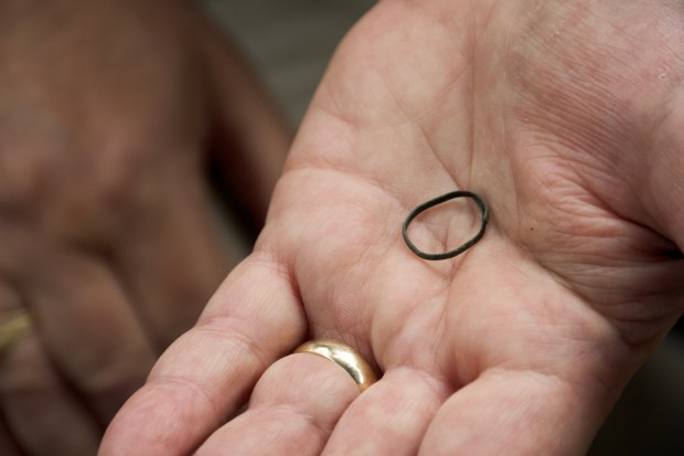 This little ring of copper came from one of the archeological pits at the Elizabethan Gardens in Manteo and may confirm a first connection between Native Americans and Sir Walter Raleigh's first expedition to Roanoke Island in 1584. (Photo by Kip Tabb/freelance)