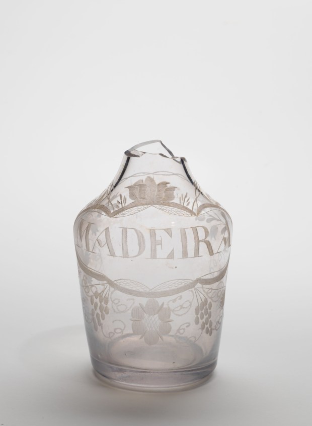 A broken leaded glass decanter for Madeira was excavated at Wetherburn's Tavern. Courtesy of The Art Museums of Colonial Williamsburg