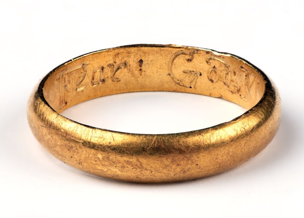 Among the items in the Worlds Collide exhibit is a gold ring for a child engraved with the name Mary Brodnax, likely crafted by her father, local goldsmith John Brodnax. Courtesy of The Art Museums of Colonial Williamsburg