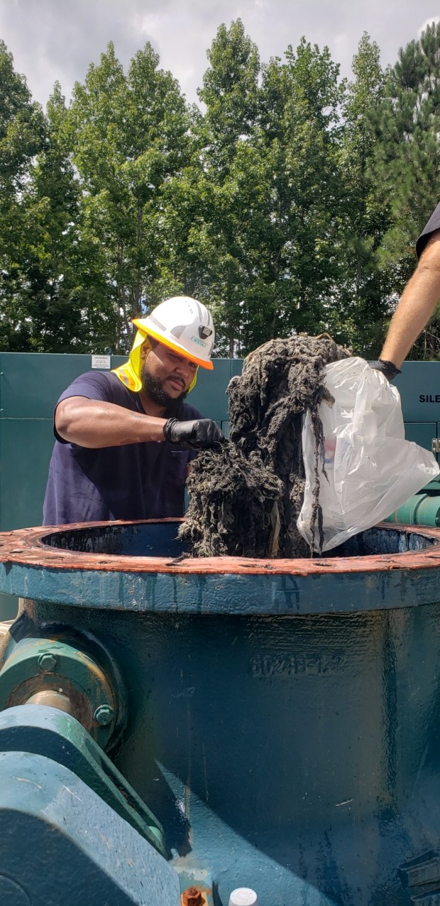 Flushable wipes being removed at Hampton Roads Sanitation District Virginia Initiative Wastewater Treatment Plant in Norfolk. (askHRgreen.org)