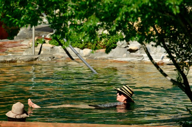 Bathers relax in the waters at Cottonwood Hot Springs at the Cottonwood Hot Springs Inn & Spa on August 14, 2022 in Buena Vista, Colorado. (Photo by Helen H. Richardson/The Denver Post)