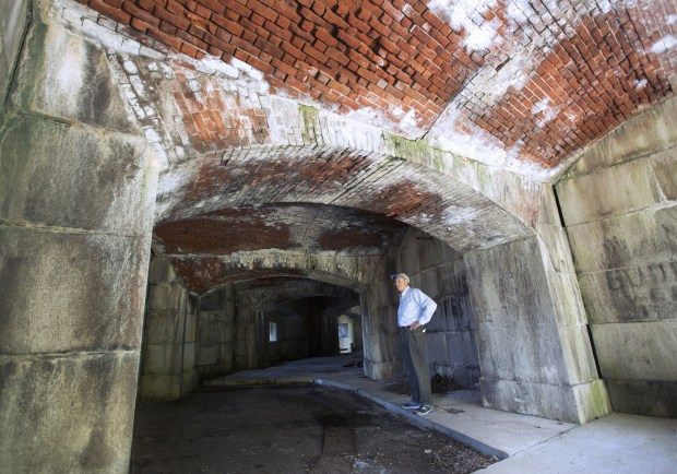 File photo from 2017 of Mike Cobb, a local historian standing inside part of Fort Wool. Fort Wool, originally named Fort Calhoun, was constructed in 1819. (L. Todd Spencer / The Virginian-Pilot)