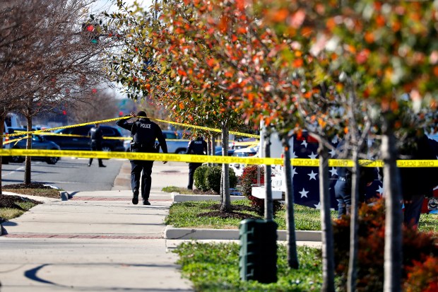 File photo, Hampton Police officers investigate a shooting that involved a police officer in the 1000 block of West Mercury Boulevard in Hampton Tuesday January 4, 2022. (Jonathon Gruenke / Daily Press)