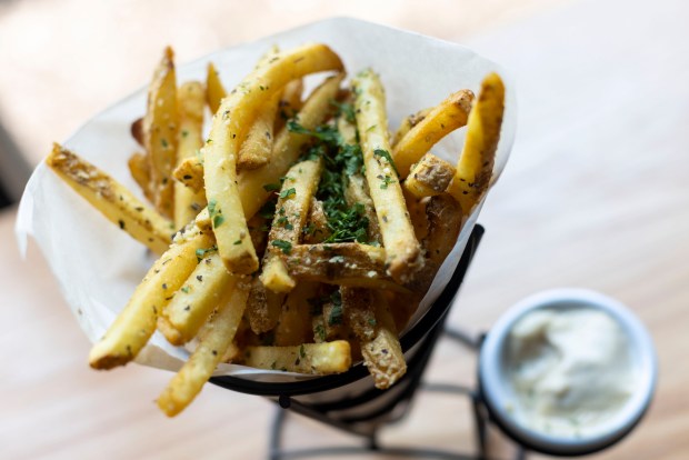 The parmesan truffle fries at Sojourn Fermentory in Suffolk on Thursday, Aug. 15, 2024. (Kendall Warner / The Virginian-Pilot)