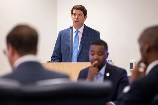 Dan Peterson, chair of the nonprofit that owns the exhibits at the Virginia Aquarium, addresses city council at Virginia Beach City Hall on Tuesday, Aug. 27, 2024. (Kendall Warner / The Virginian-Pilot)