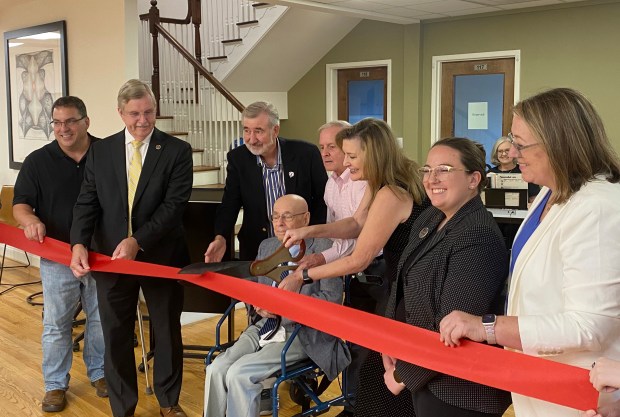 Dignity for the Aged a nonprofit, celebrates the opening of their office in Newport News, Virginia. , Aug. 23, 202. At the ceremony, Sen. Danny Diggs and Poquoson government leaders praised the nonprofit for raising awareness about problems with nursing homes. (Josh Janney / Staff)