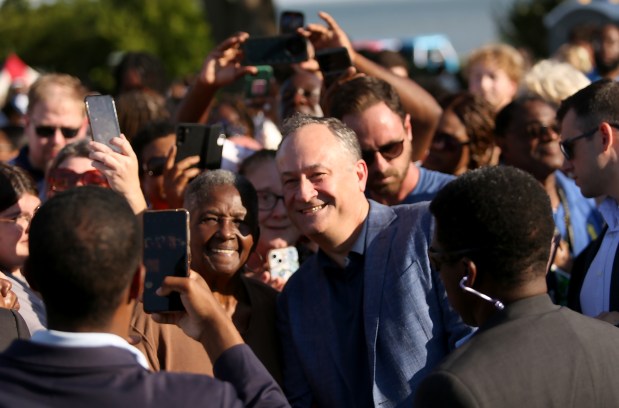 Doug Emhoff, the Second Gentleman, takes selfies with throngs of supporters along the rope line at Rep. Bobby Scott's annual Labor Day cookout Monday, Sept. 2, 2024, in Newport News.. (Stephen M. Katz / The Virginian-Pilot)