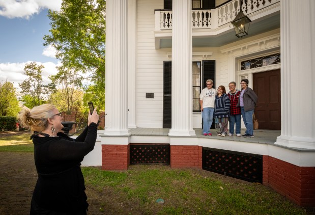 Tourists visiting from Nashville visit, Snowdoun, a historic antebellum home, during Pilgrimage in Columbus, Miss., on April 3, 2024. Each spring, Columbus, Miss., has opened its Civil War-era homes to visitors. Some say the event should reflect more the oppression behind the architecture, and how the city has changed since. (Kate Medley/The New York Times)