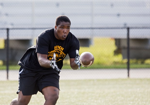 Kellam High School sophomore Kemari Copeland makes a catch during a drill at the Beach District football showcase on May 7, 2019 in Virginia Beach.